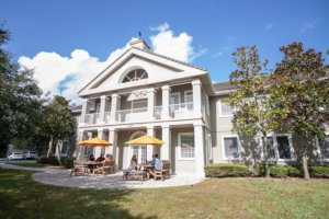 people on the outdoor patio at tides edge