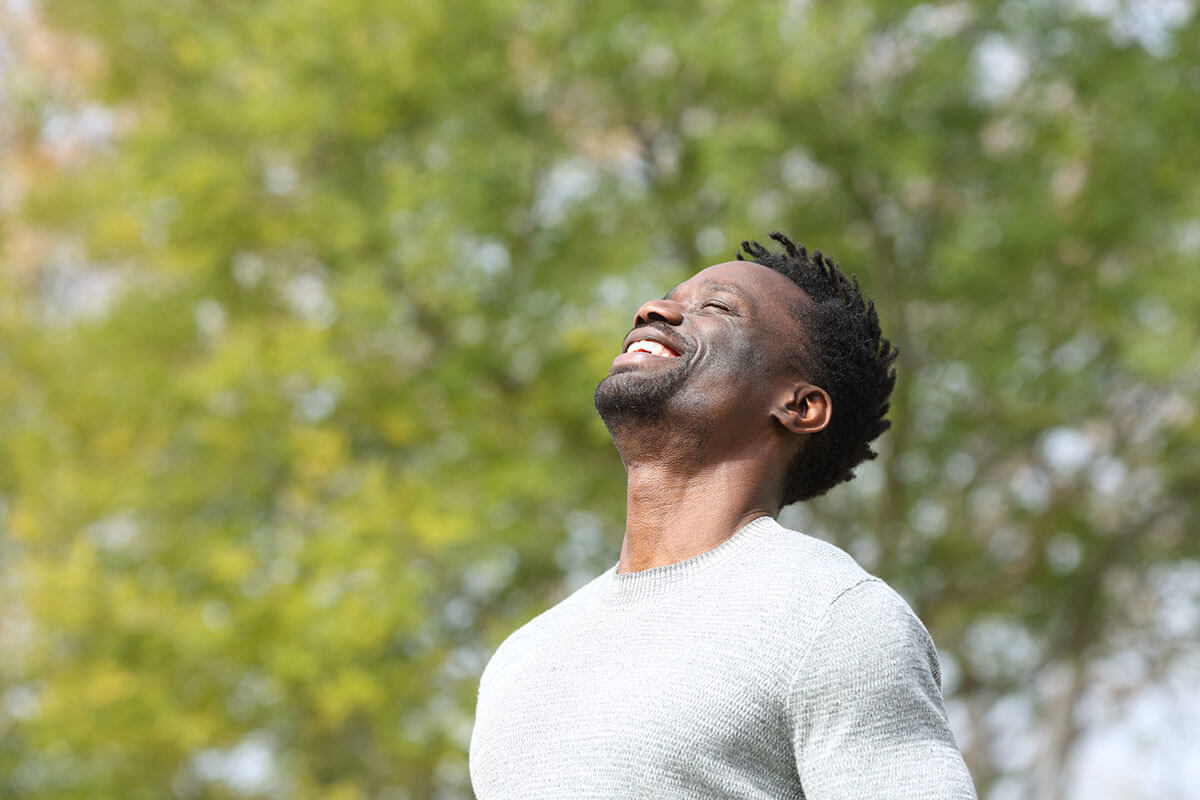 Man Smiling Because of Medical Detox Center in North Carolina
