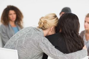 patients hugging in medical detox center