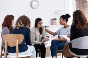 Group of women discuss their detox center in Florida