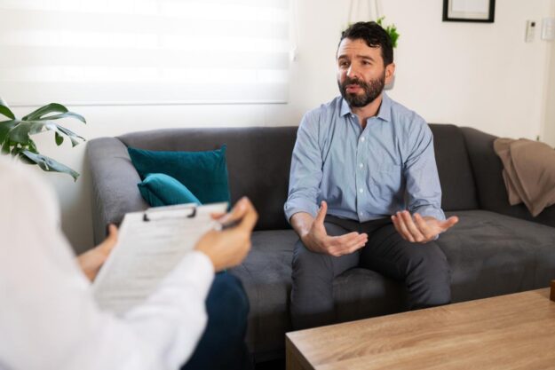 When is Inpatient Detox Necessary_ A man discusses inpatient detox with a therapist