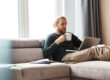 A man reading about the difference between inpatient and outpatient treatment
