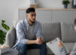 Man sitting on couch in counseling session