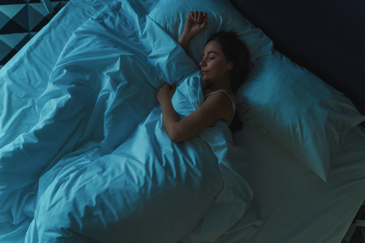 Woman sleeping in bed